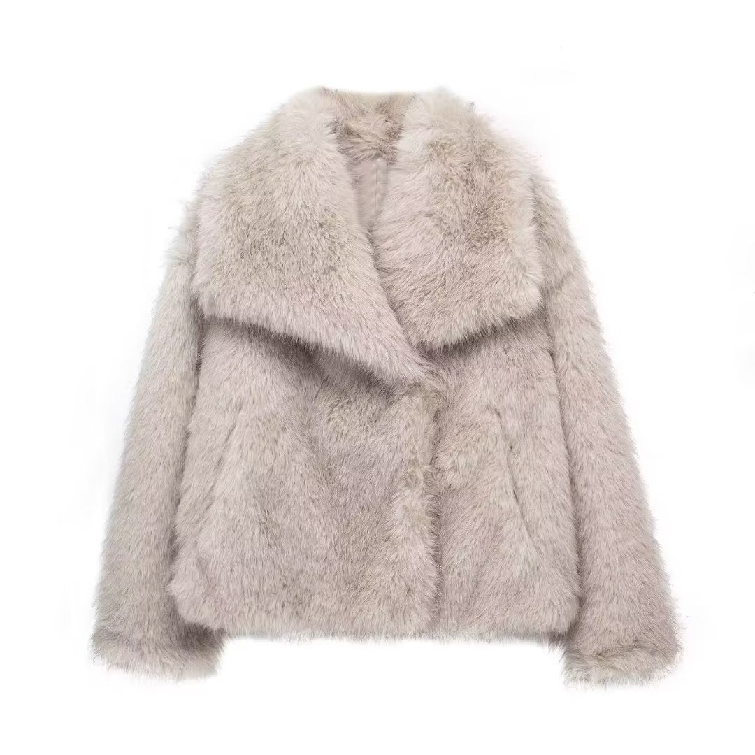 Embrace Winter's Warmth: Luxurious Plush Coat with Chic Lapel. Stay cozy and stylish all season long with this must-have winter coat. Featuring a thick, plush exterior for ultimate warmth, a sophisticated lapel design, and a relaxed, long-sleeve silhouett