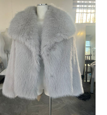 Embrace Winter's Warmth: Luxurious Plush Coat with Chic Lapel. Stay cozy and stylish all season long with this must-have winter coat. Featuring a thick, plush exterior for ultimate warmth, a sophisticated lapel design, and a relaxed, long-sleeve silhouett